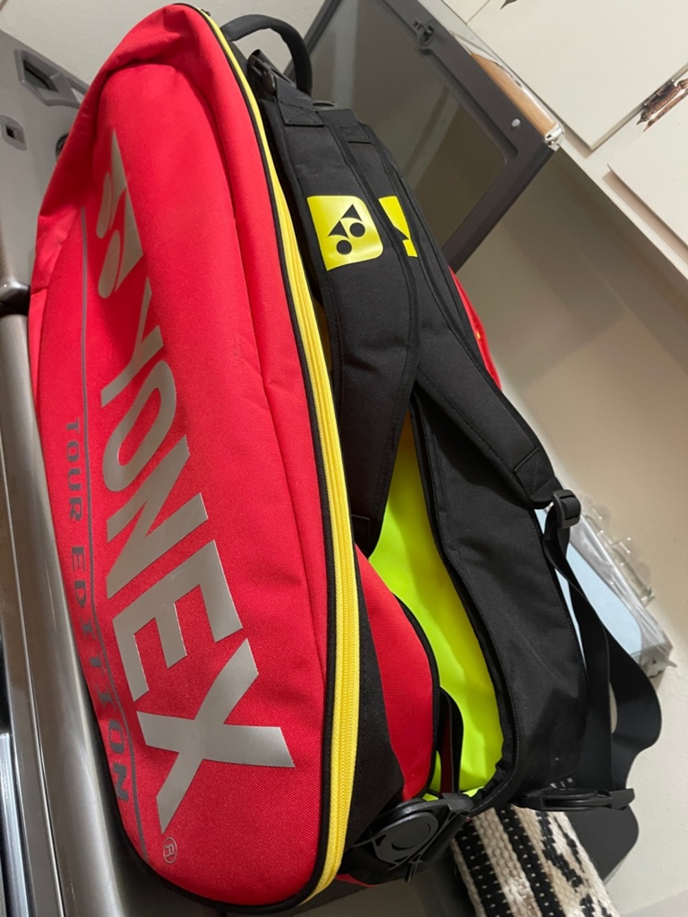 Yonex Red and Black Tennis Bag with Yellow Accents